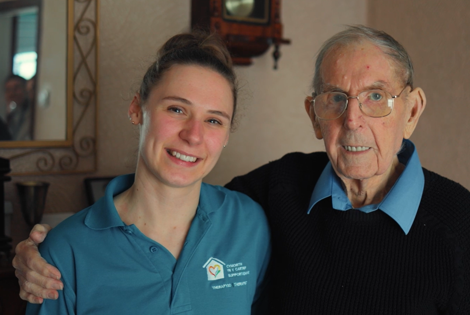 Bill with Holly his reablement worker smiling