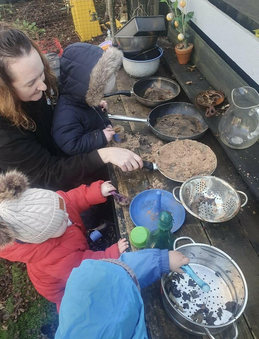Sarah playing outside with the children