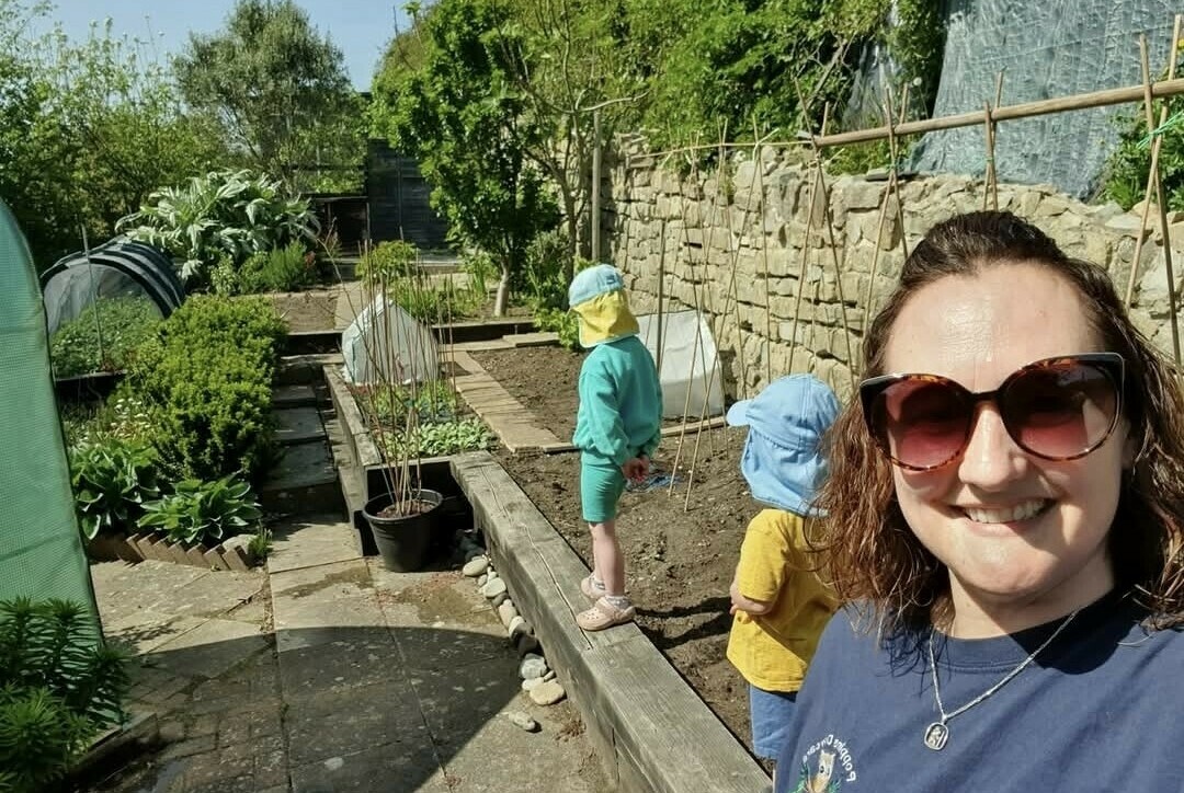 Sarah in her allotment