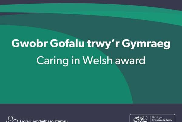 Caring in Welsh award Title