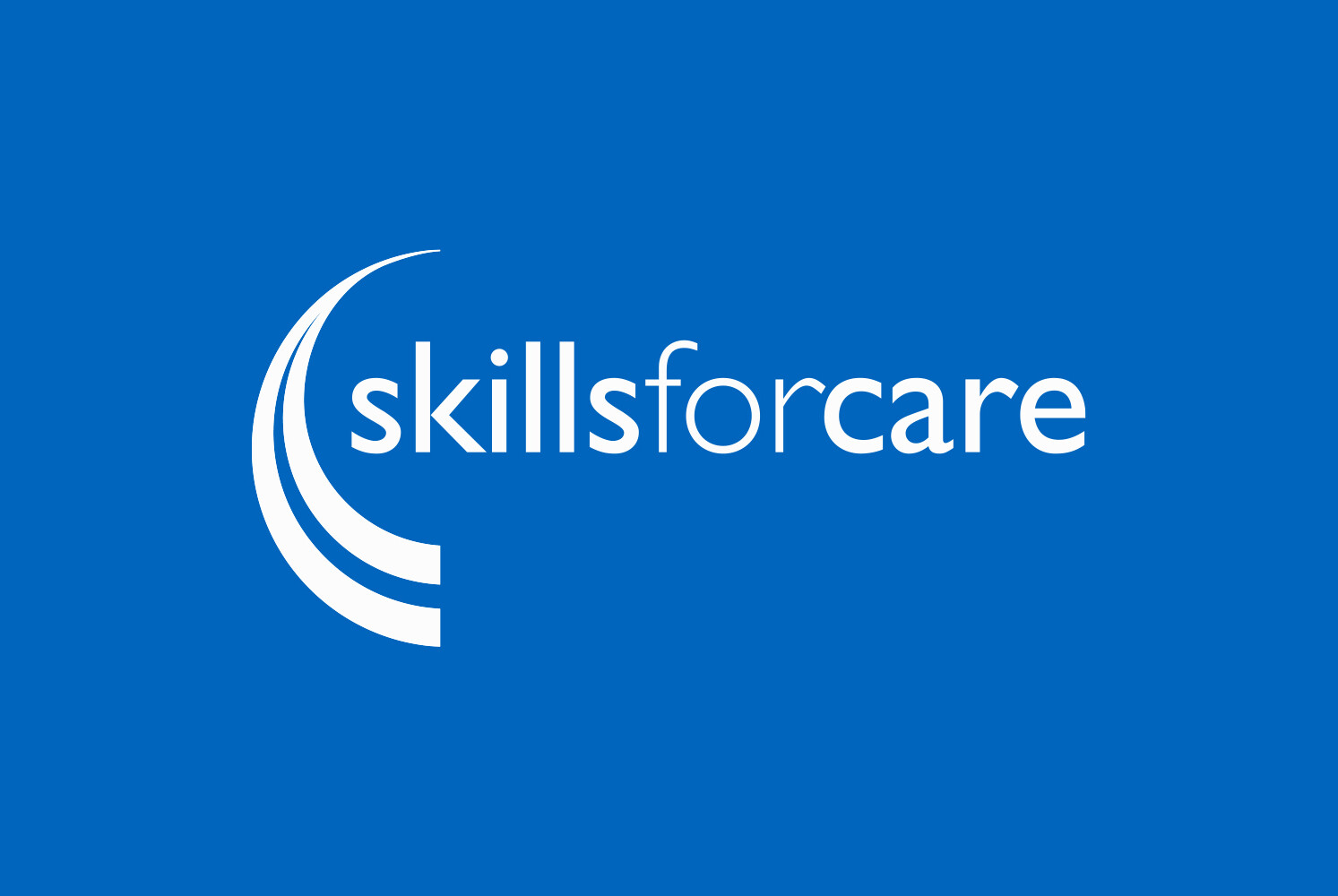Skills For Care Logo on a blue background